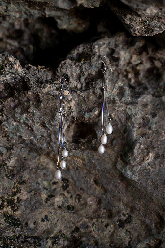 Long silver earrings with pearls